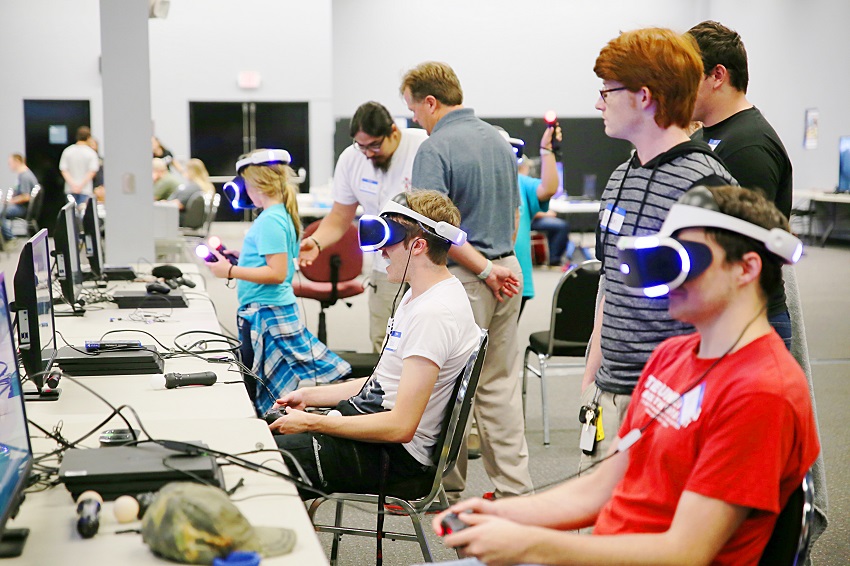 Attendees of the Local Area Network party at East Mississippi Community College’s Golden Triangle campus last year make use of the virtual reality equipment that was available. The LAN party returns this year on March 1. A Digital Symposium will be held Feb. 28.